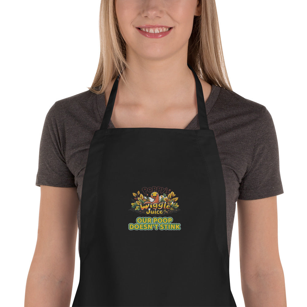 Poppy's Wiggle Juice embroidered apron in black, with the Poppy's Wiggle Juice logo